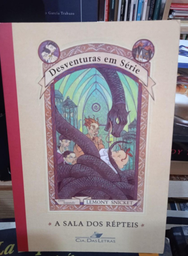 Portada do libro de A SALA DOS RÉPTEIS - LEMONY SNICKET (T)