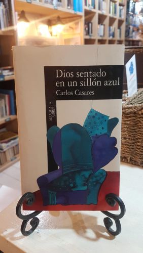 DIOS SENTADO EN UN SILLON AZUL