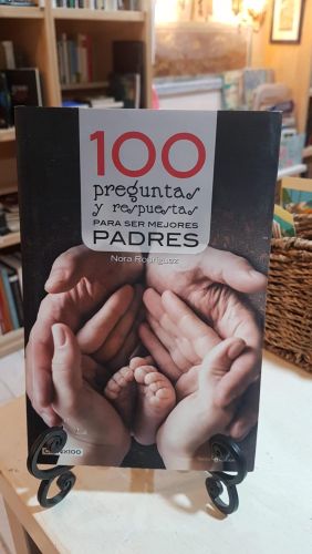 Portada do libro de 100 preguntas y respuestas para ser mejores padres
